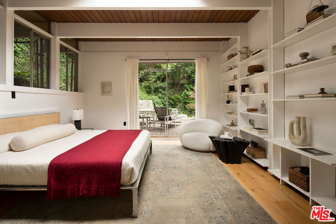 7330 Pyramid Drive Los Angeles, CA 90068 - Photo 10 of 28 a bedroom with two beds and a large window