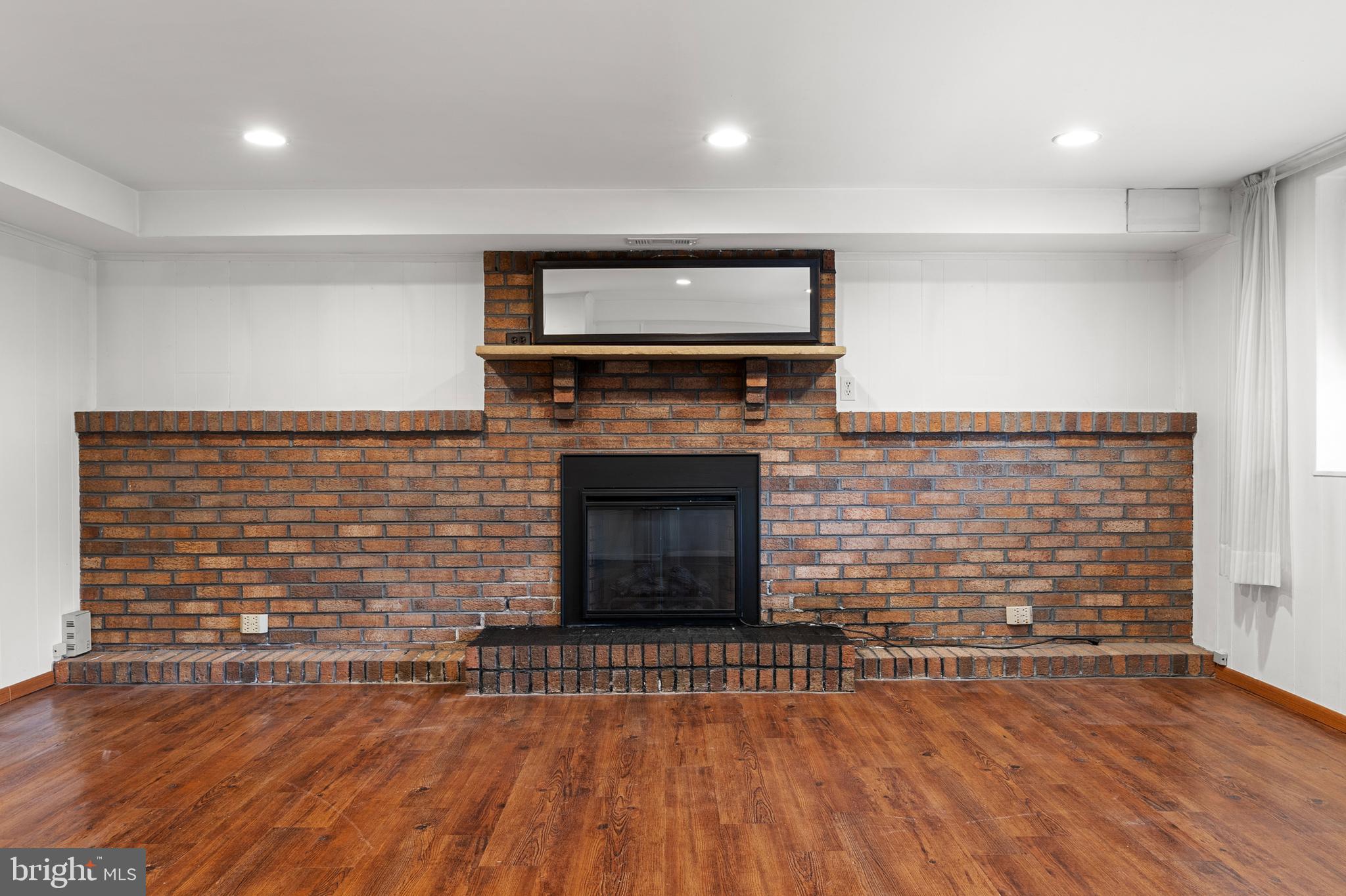 9945 Sandy Road Philadelphia, PA 19115 - Photo 32 of 45 Stunning Brick Gas Fireplace in basement
