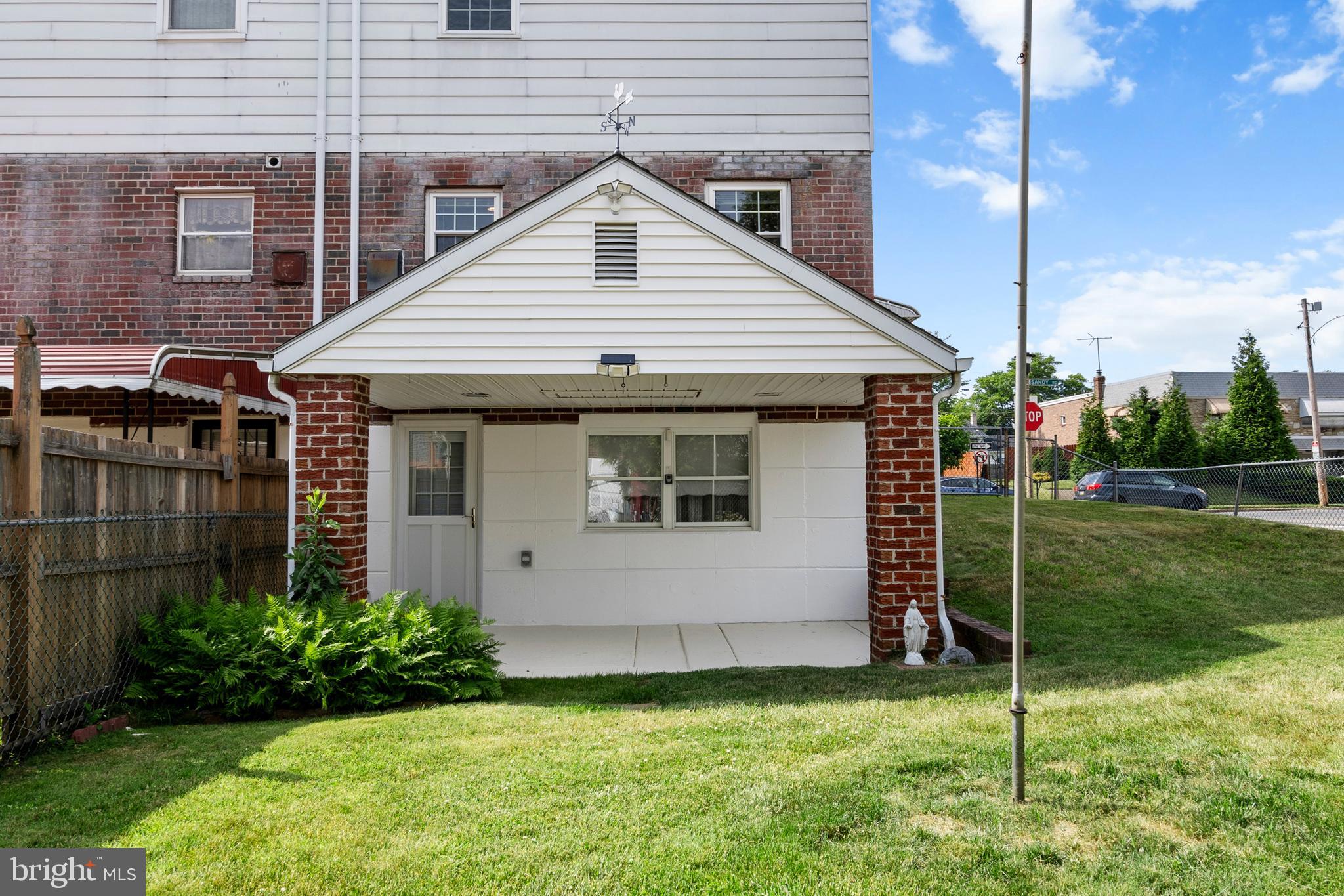9945 Sandy Road Philadelphia, PA 19115 - Photo 37 of 45 Back view of house with covered patio