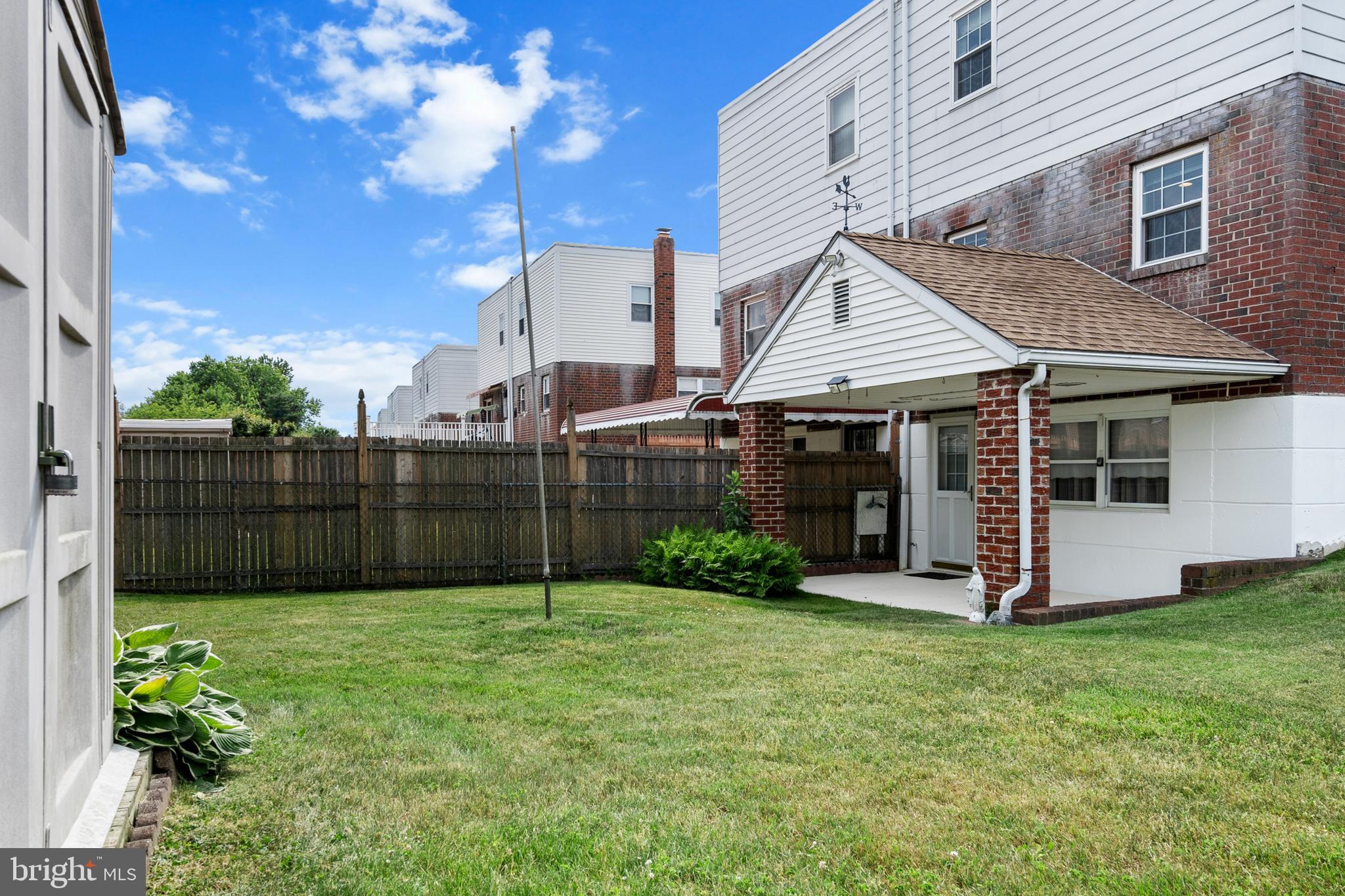 9945 Sandy Road Philadelphia, PA 19115 - Photo 39 of 45 Backyard with covered patio