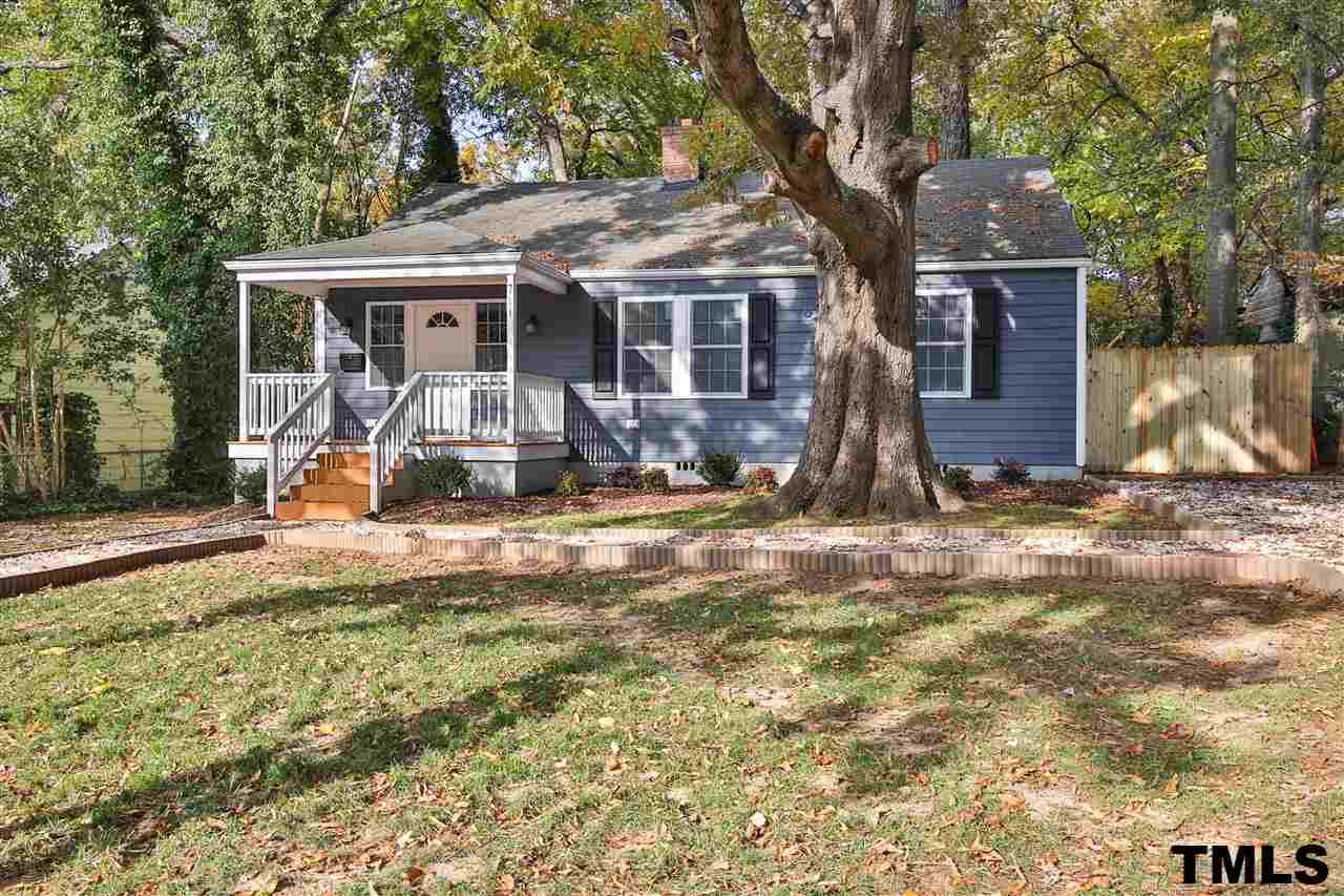 711 Tyler Road Raleigh, NC 27604 - Photo 1 of 24 front view of a house with a yard
