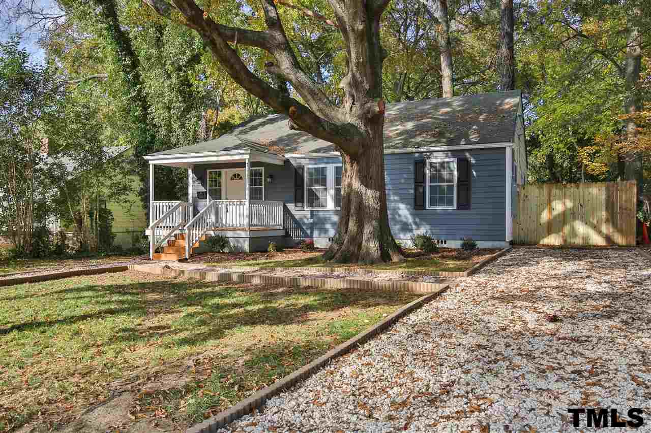 711 Tyler Road Raleigh, NC 27604 - Photo 2 of 24 a front view of a house with yard patio and tree