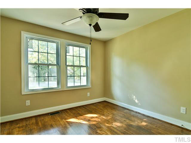 711 Tyler Road Raleigh, NC 27604 - Photo 17 of 24 a view of an empty room and window
