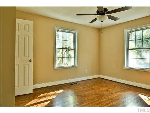 711 Tyler Road Raleigh, NC 27604 - Photo 18 of 24 a view of an empty room with a window