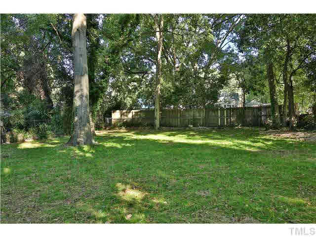711 Tyler Road Raleigh, NC 27604 - Photo 23 of 24 a swimming pool with outdoor seating and yard