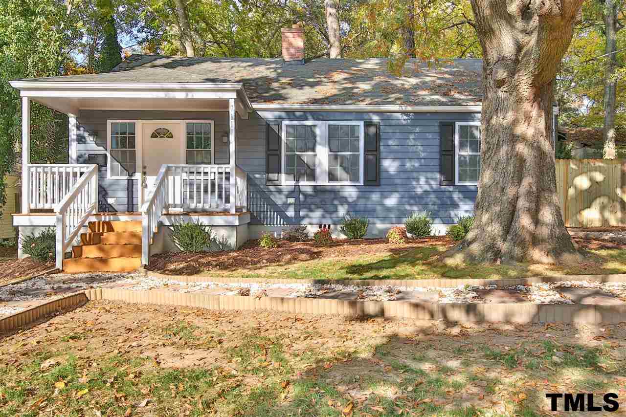 711 Tyler Road Raleigh, NC 27604 - Photo 4 of 24 a front view of a house with a yard