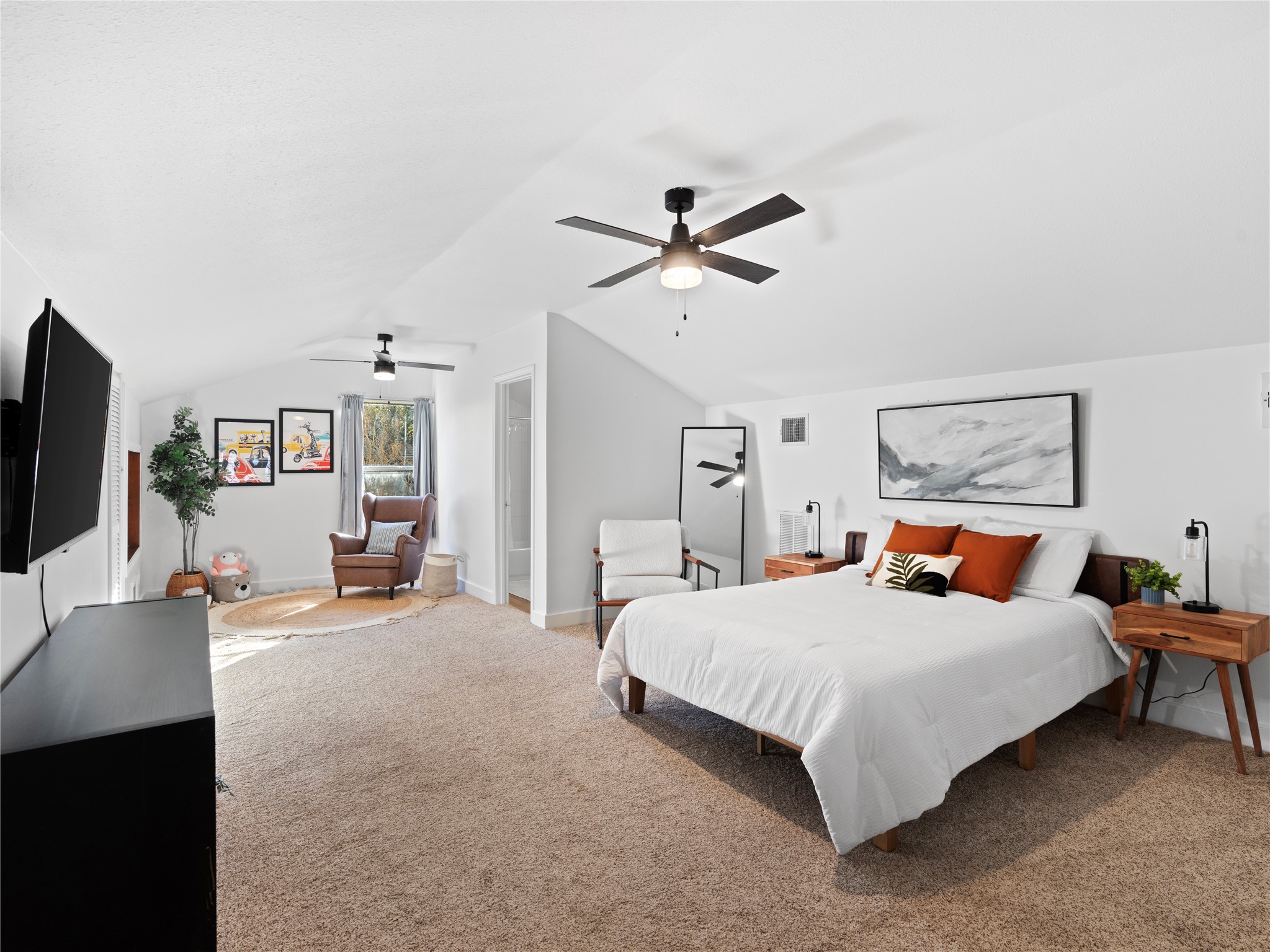 5108 Sioux Lane Austin, TX 78734 - Photo 26 of 35 a bedroom with a bed and a flat screen tv