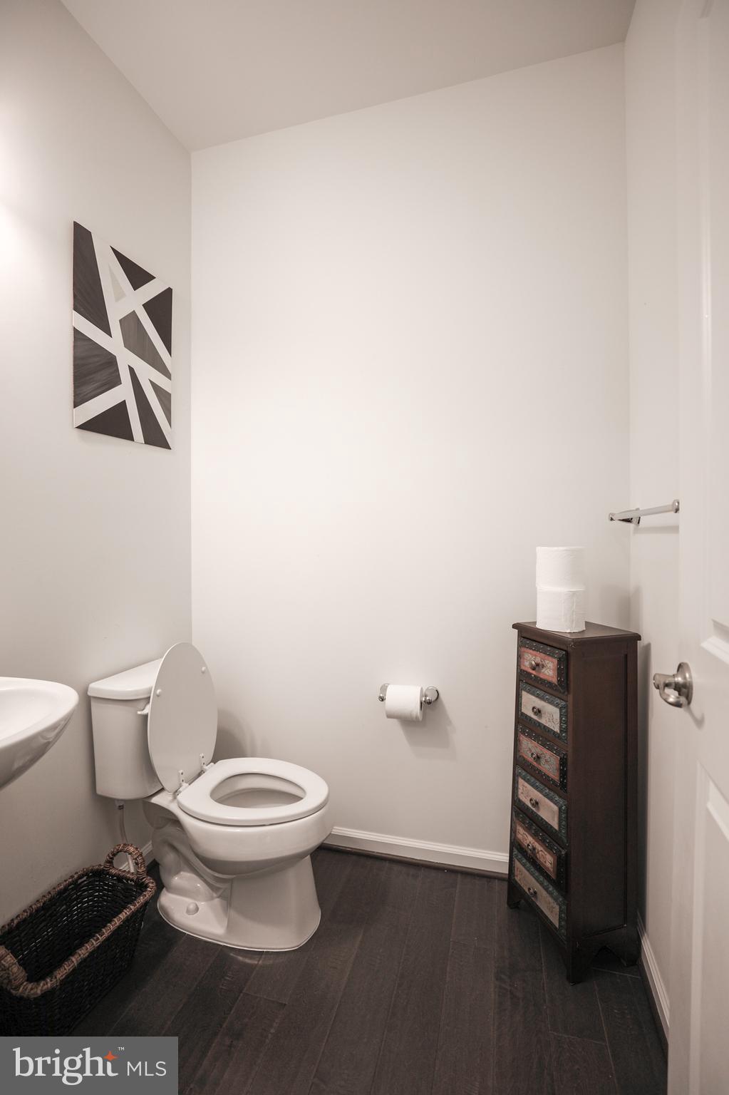 1024 Cook Drive Southeast Washington, DC 20032 - Photo 37 of 44 a bathroom with a toilet and a vanity