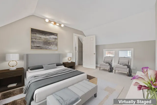 a bedroom with a bed and furniture