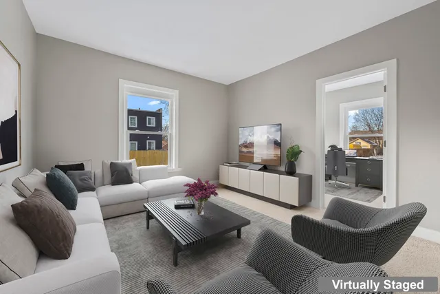 a living room with furniture and a couch