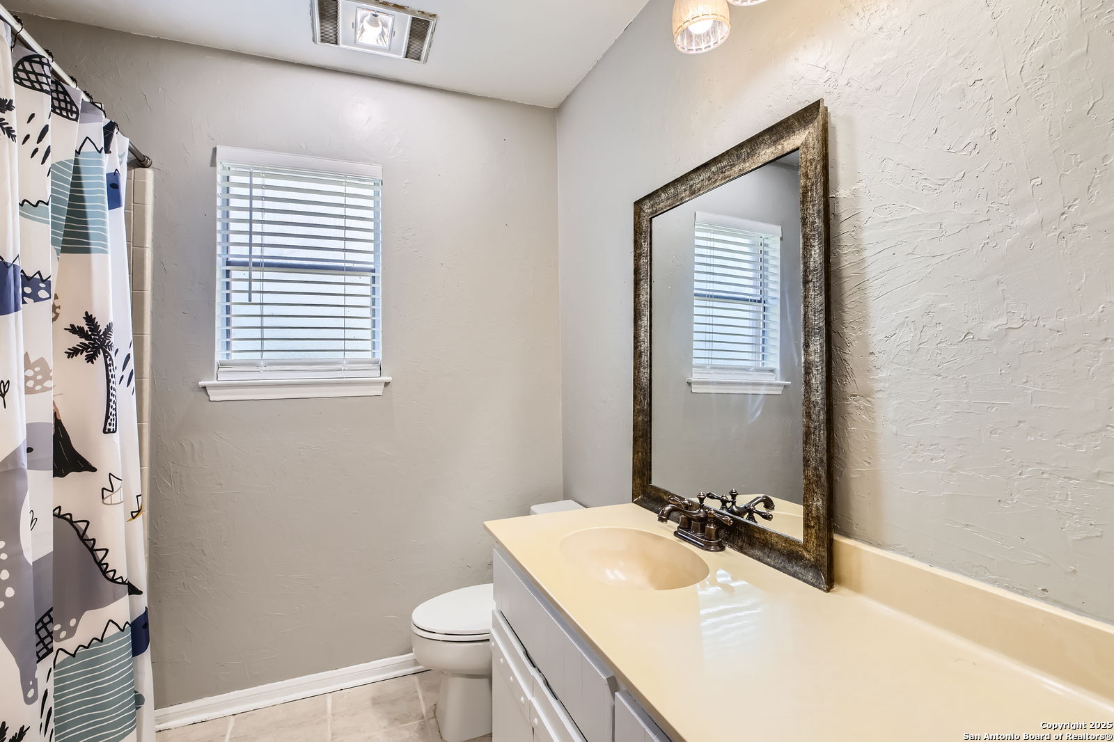 1608 Kings Ranch Road Bandera, TX 78003 - Photo 13 of 14 a bathroom with a sink toilet vanity and tub