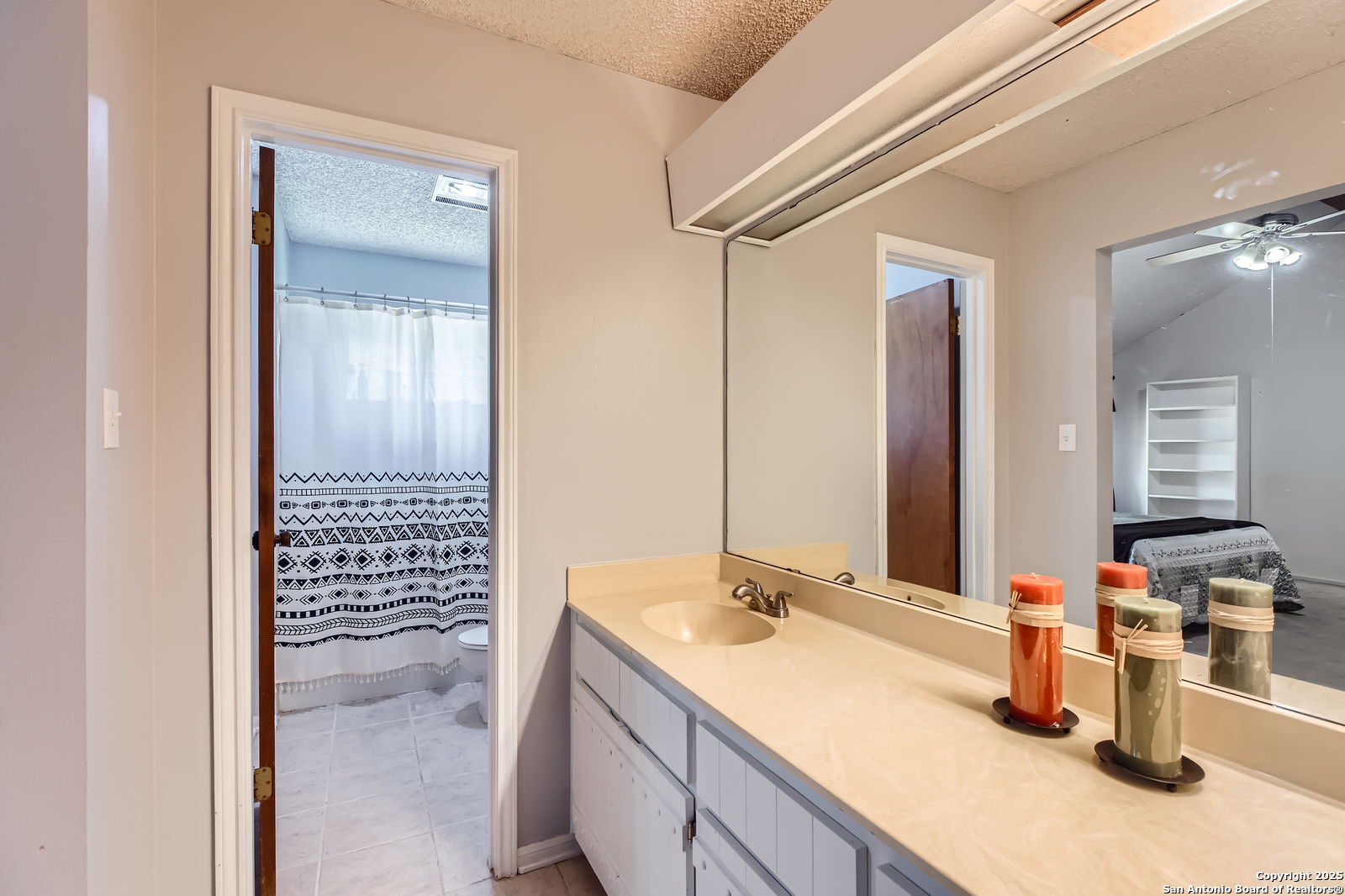 1608 Kings Ranch Road Bandera, TX 78003 - Photo 10 of 14 a bathroom with a sink and a mirror
