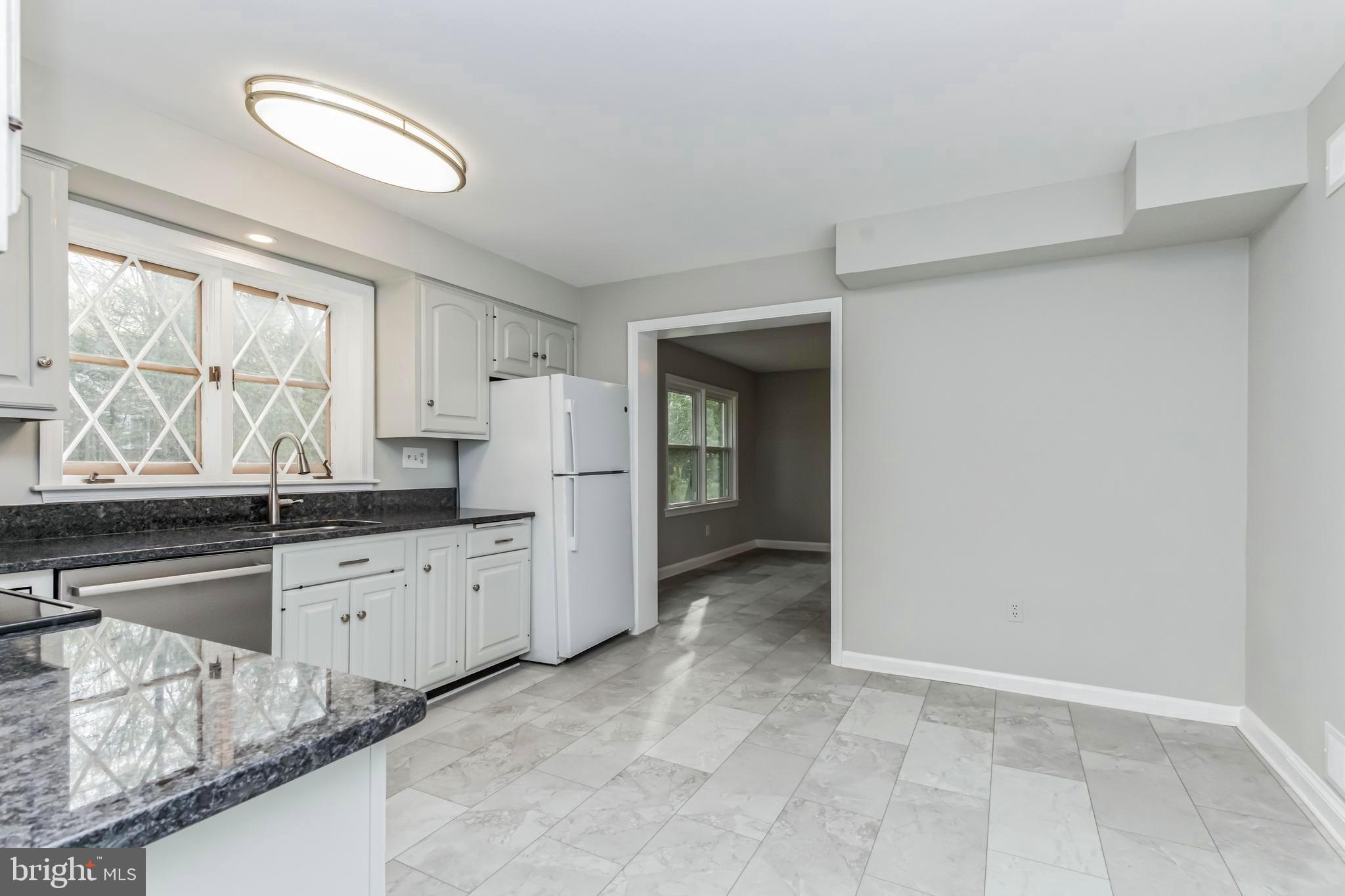 14315 Chesterfield Road Rockville, MD 20853 - Photo 13 of 33 Tablespace Kitchen!