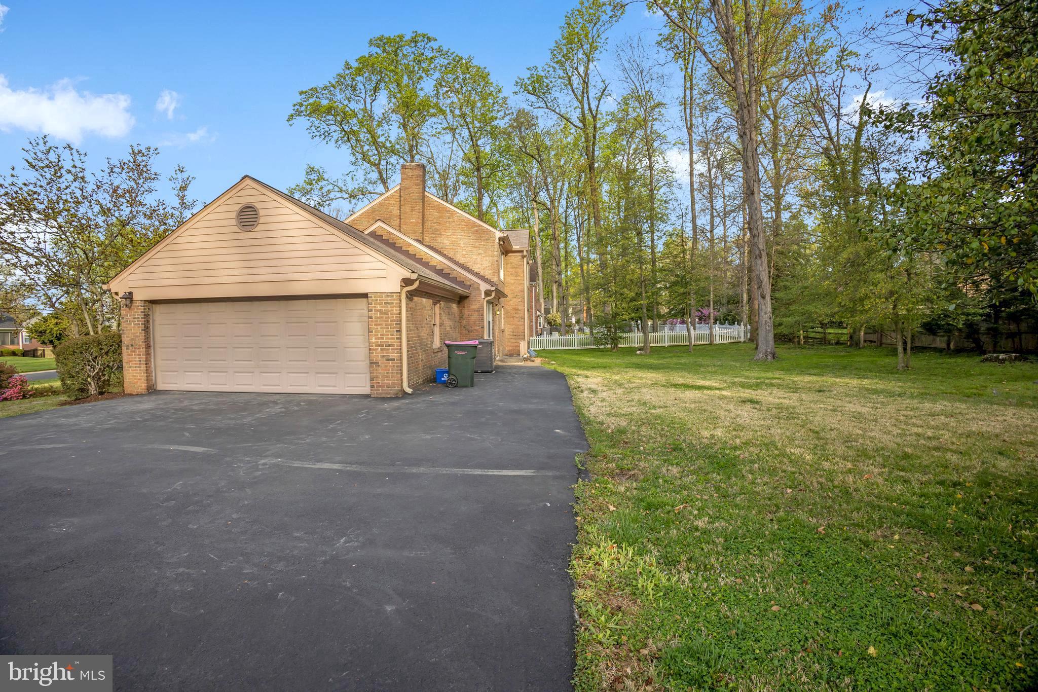 14315 Chesterfield Road Rockville, MD 20853 - Photo 2 of 33 Side-Entry 2-Car Garage and Large Driveway