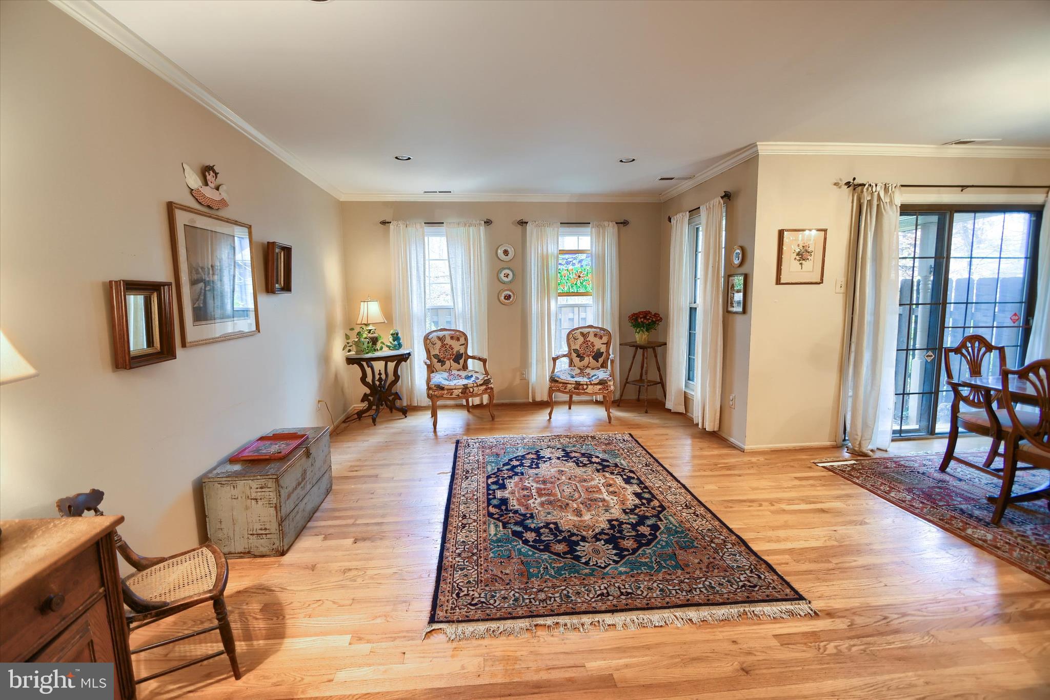 1304 Weatherstone Drive, Unit 1304 Paoli, PA 19301 - Photo 14 of 35 a living room with furniture rug and wooden floor