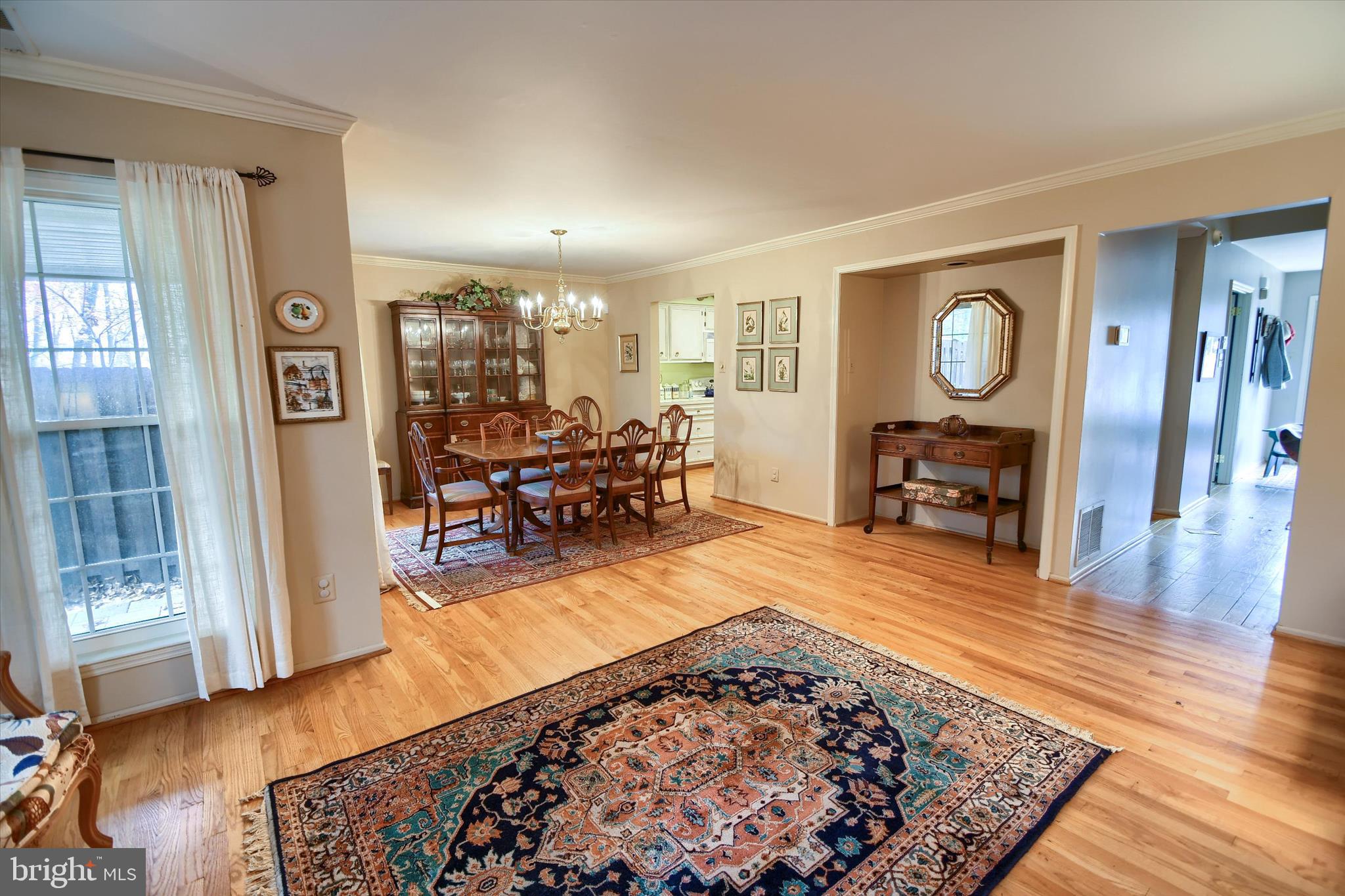 1304 Weatherstone Drive, Unit 1304 Paoli, PA 19301 - Photo 15 of 35 a living room with furniture and a wooden floor