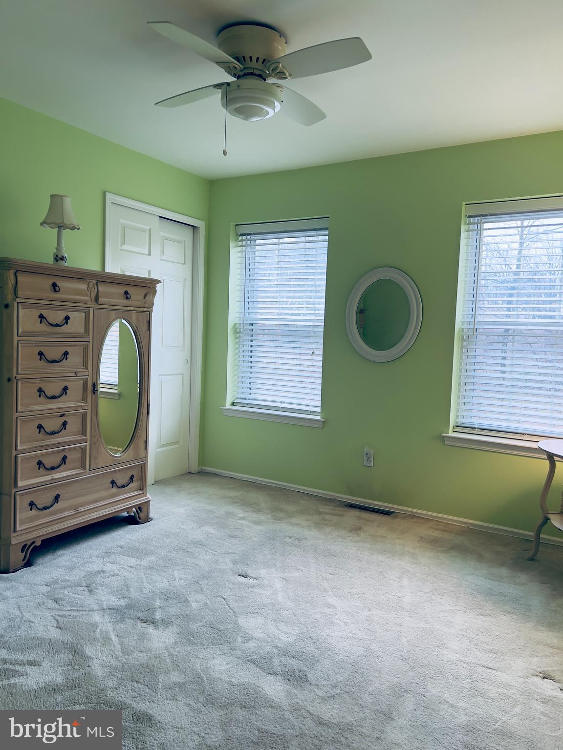 1304 Weatherstone Drive, Unit 1304 Paoli, PA 19301 - Photo 19 of 35 a view of an empty room with a fireplace and a window