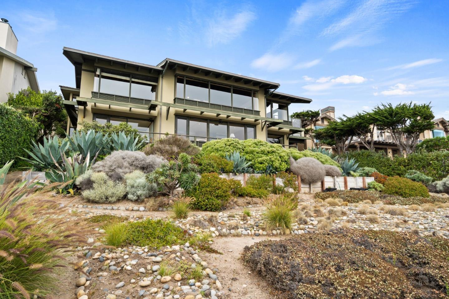 2615 Ribera Road Carmel, CA 93923 - Photo 2 of 23 a front view of a house with a yard