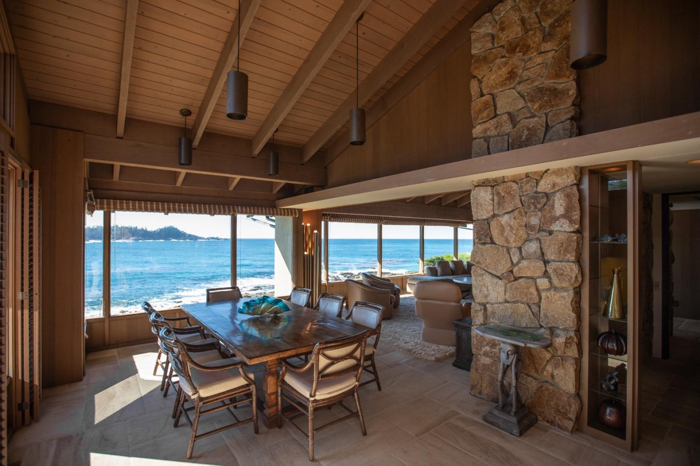 2615 Ribera Road Carmel, CA 93923 - Photo 3 of 23 a view of a dining room with furniture wooden floor and a rug