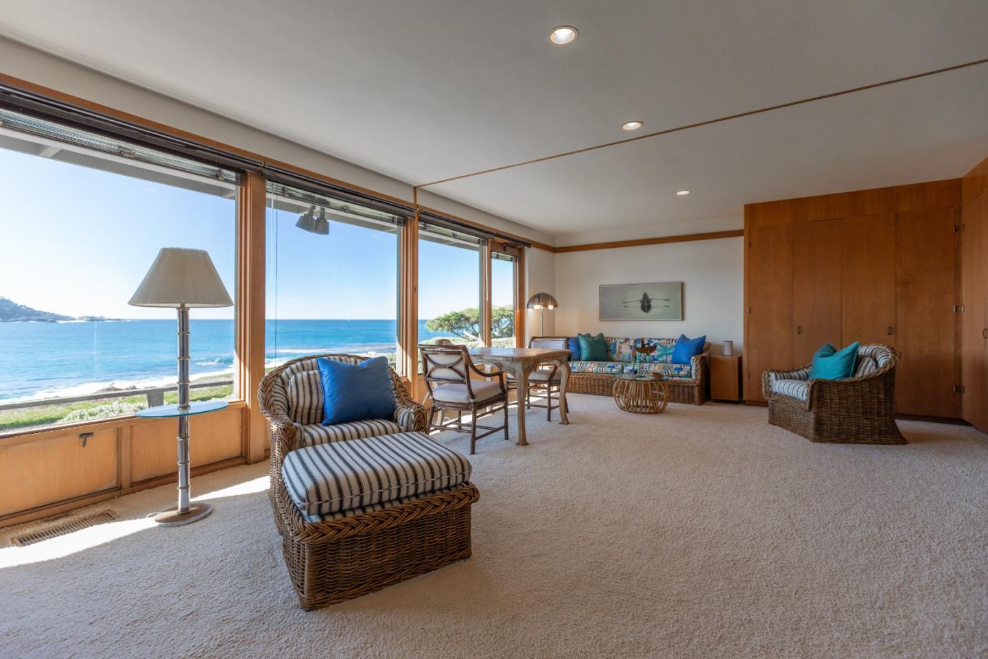2615 Ribera Road Carmel, CA 93923 - Photo 5 of 23 a living room with furniture and a floor to ceiling window