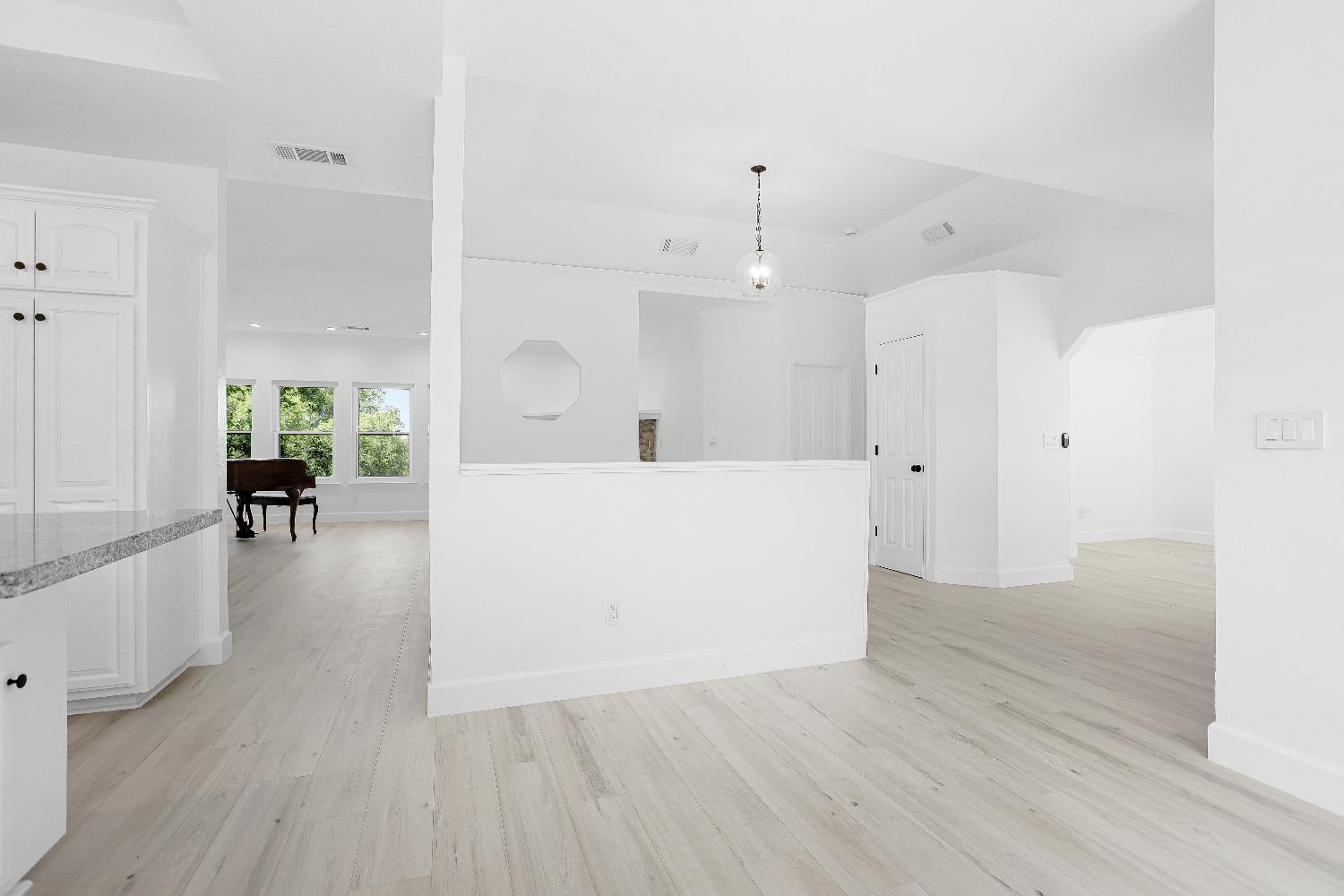 3740 North Lakeshore Boulevard Loomis, CA 95650 - Photo 13 of 67 Unstaged dining room featuring light wood finished floors and baseboards