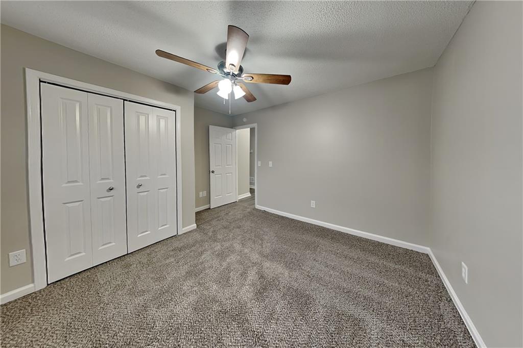35 Amber Trace Dallas, GA 30132 - Photo 12 of 19 an empty room with chandelier fan