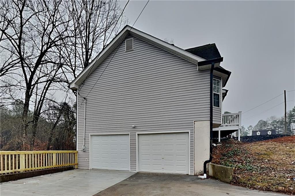35 Amber Trace Dallas, GA 30132 - Photo 16 of 19 a view of a house with a yard
