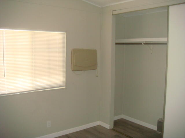 12972 Emerald Drive Whitewater, CA 92282 - Photo 17 of 55 a view of a small space with wooden floor and a window