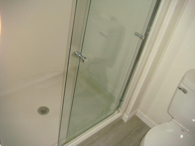 12972 Emerald Drive Whitewater, CA 92282 - Photo 20 of 55 a bathroom with a shower