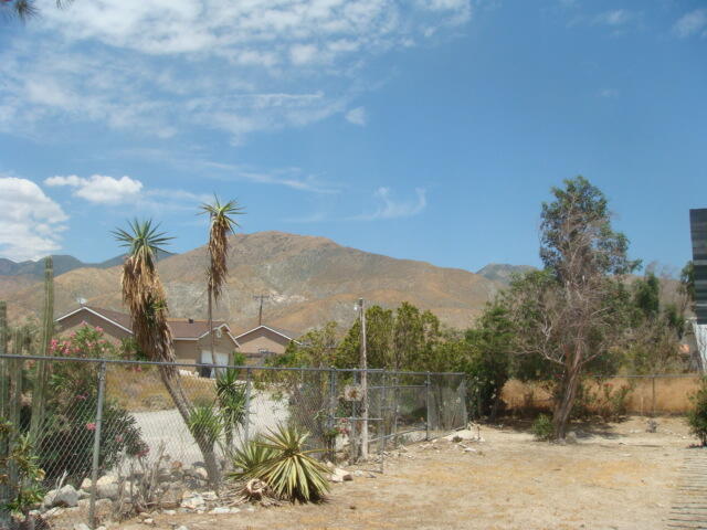 12972 Emerald Drive Whitewater, CA 92282 - Photo 29 of 55 a view of a lake with a mountain in the background