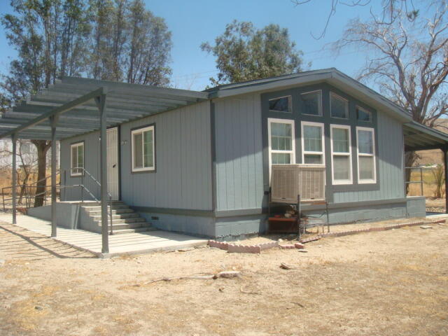 12972 Emerald Drive Whitewater, CA 92282 - Photo 3 of 55 a front view of a house