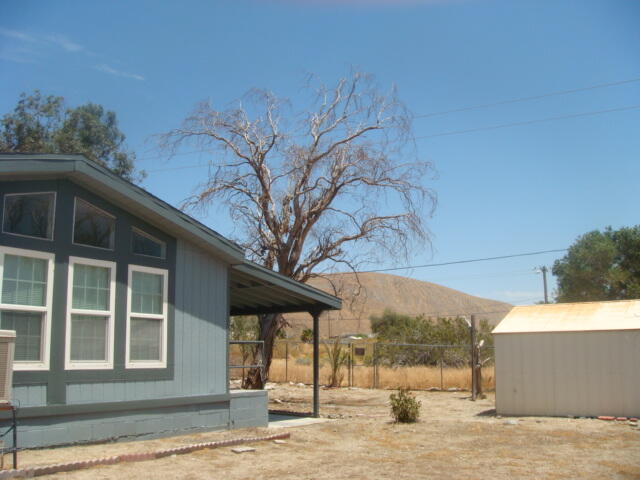 12972 Emerald Drive Whitewater, CA 92282 - Photo 38 of 55 a view of a building with a tree