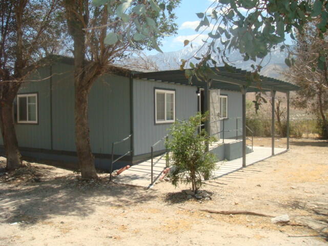 12972 Emerald Drive Whitewater, CA 92282 - Photo 46 of 55 a view of a house with a yard covered in snow