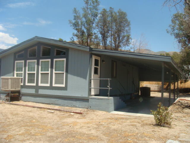 12972 Emerald Drive Whitewater, CA 92282 - Photo 8 of 55 a front view of a house with a yard