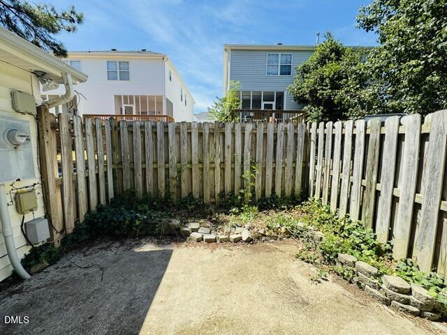 2027 Turtle Point Drive Raleigh, NC 27604 - Photo 10 of 18 a view of a house with a small yard and plants