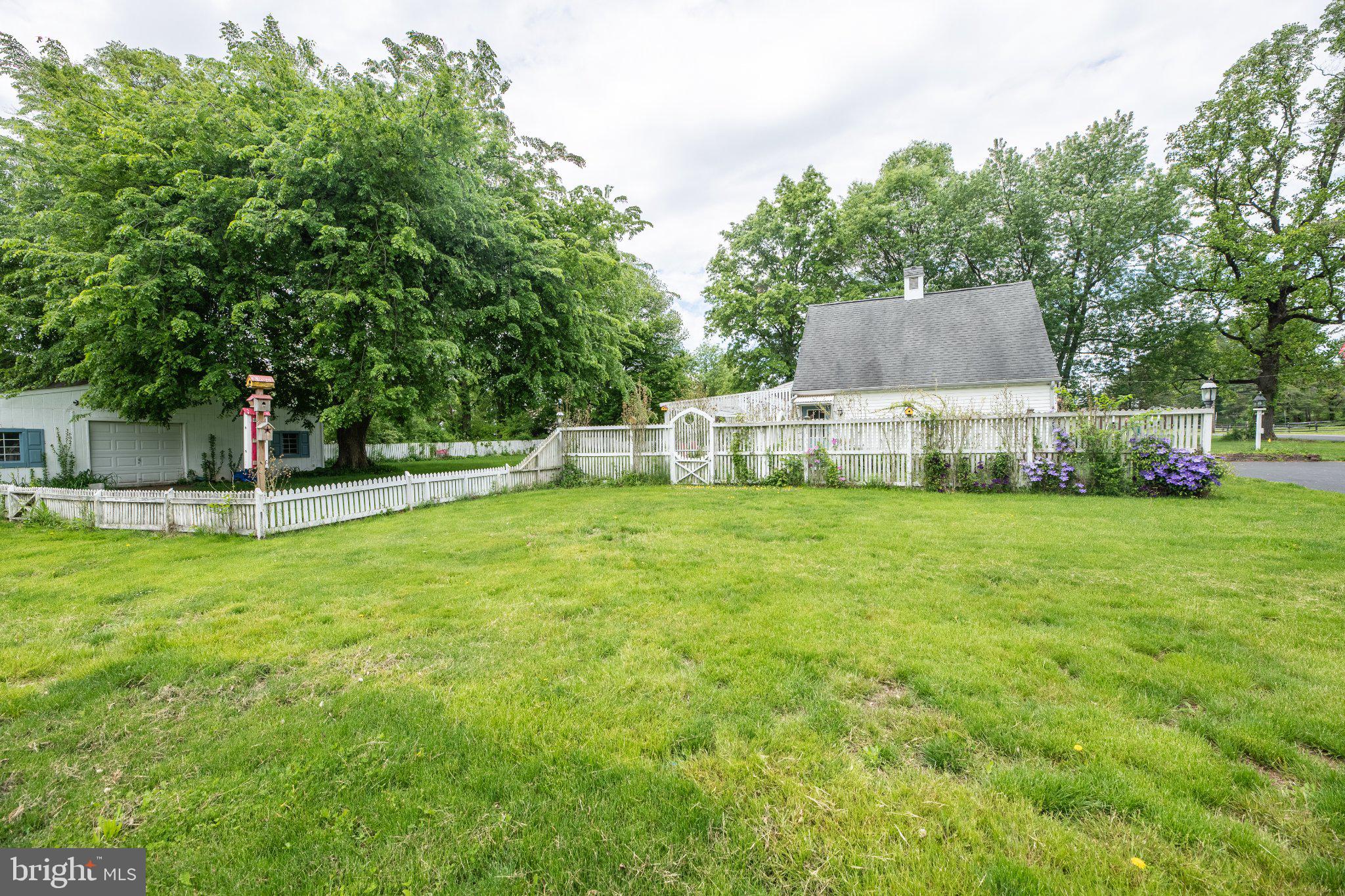 57 Diverty Road Pennington, NJ 08534 - Photo 72 of 86 Charming home with lush green surroundings.