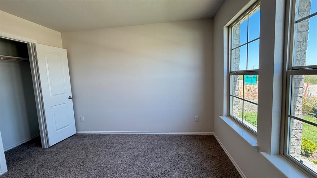 2007 Reveille Way Terrell, TX 75160 - Photo 10 of 31 an empty room with windows