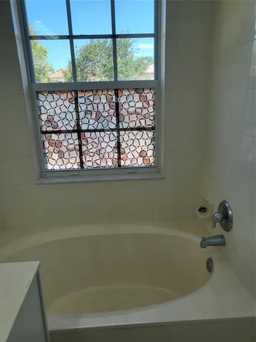 a bathroom with a bathtub