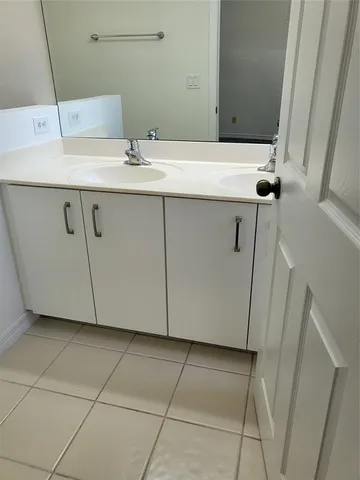 a bathroom with a sink and a vanity