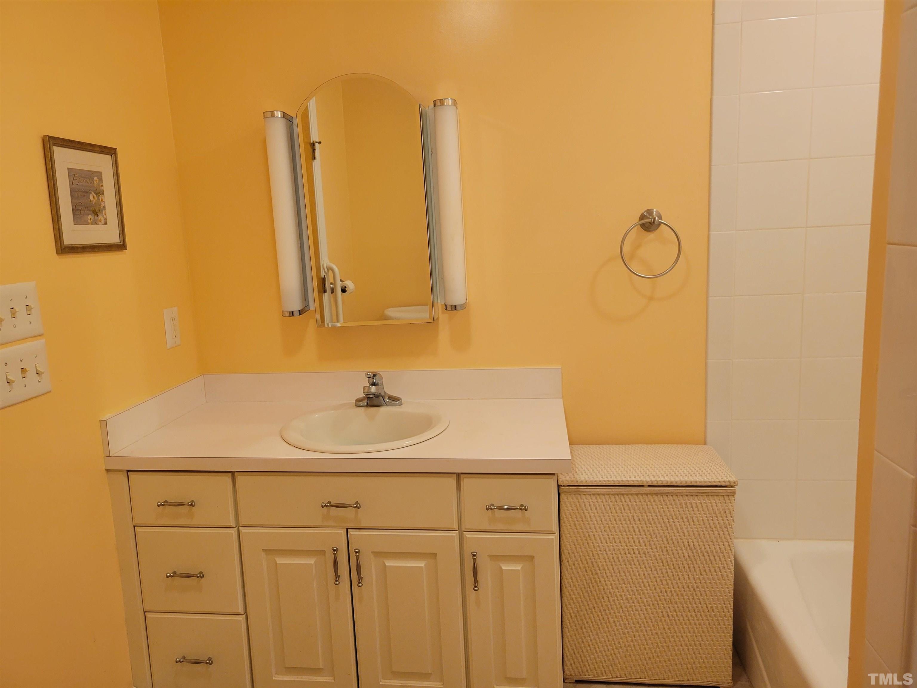 2656 Prophecy Road Middlesex, NC 27557 - Photo 7 of 26 a bathroom with a sink and a mirror
