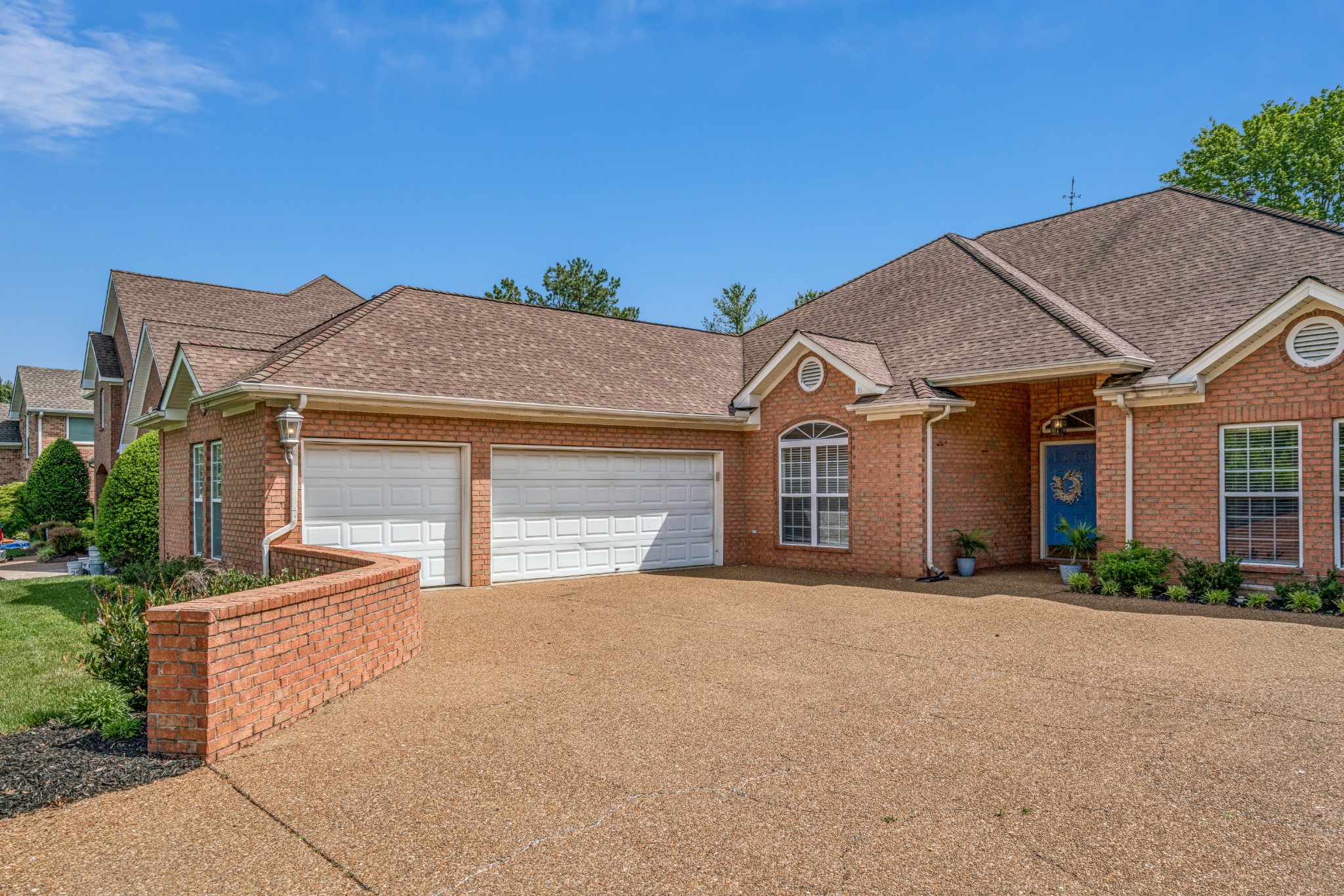 532 Bancroft Way Franklin, TN 37064 - Photo 2 of 48 a front view of a house with a yard and garage