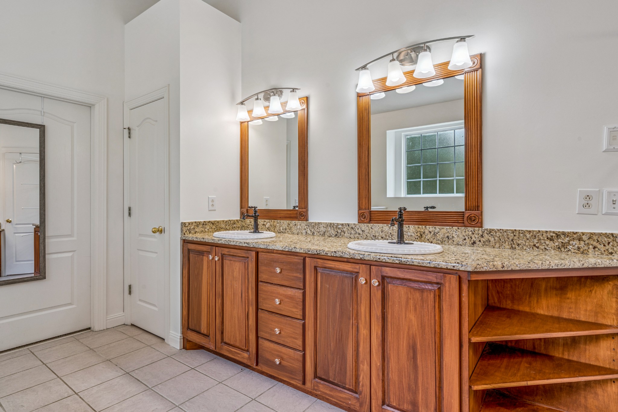 532 Bancroft Way Franklin, TN 37064 - Photo 21 of 48 a bathroom with a granite countertop sink and a mirror