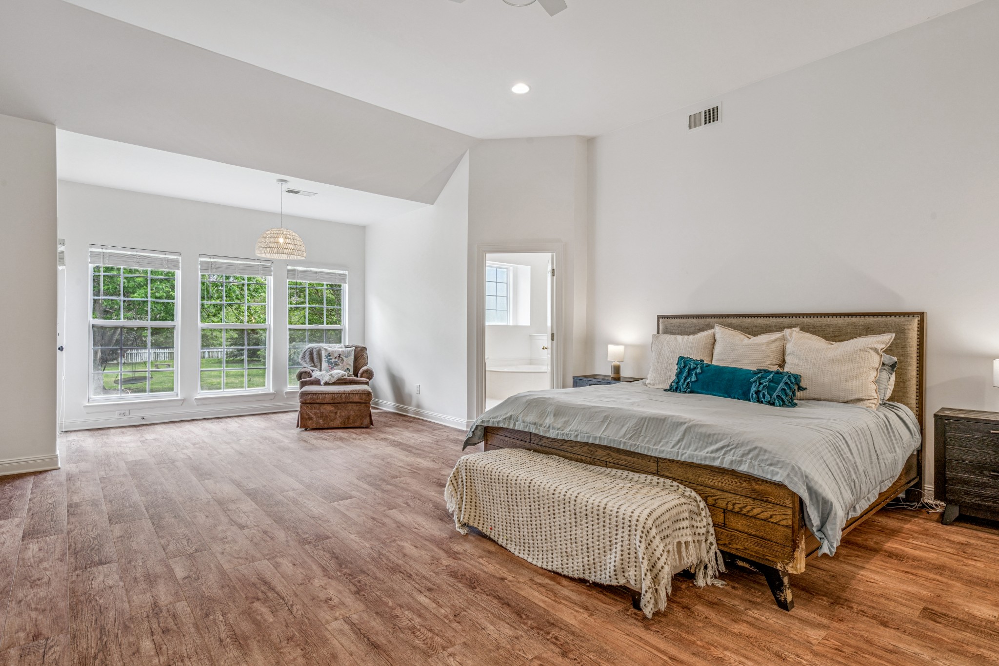 532 Bancroft Way Franklin, TN 37064 - Photo 23 of 48 a spacious bedroom with a bed and a large window