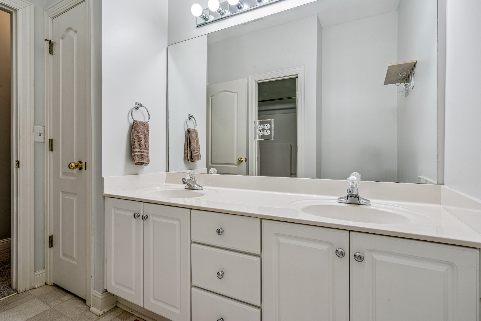 532 Bancroft Way Franklin, TN 37064 - Photo 29 of 48 a bathroom with a double vanity sink and a mirror