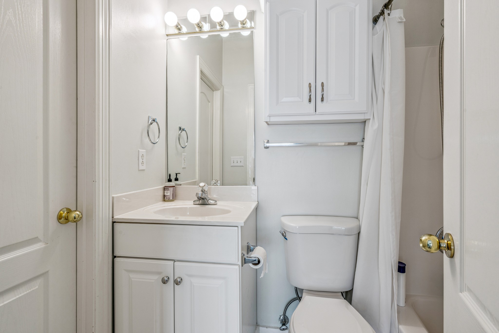 532 Bancroft Way Franklin, TN 37064 - Photo 31 of 48 a bathroom with a toilet a sink and a mirror