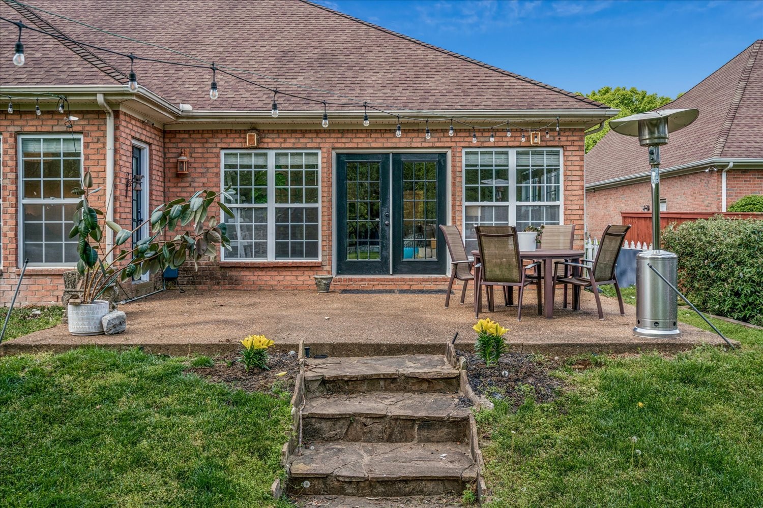 532 Bancroft Way Franklin, TN 37064 - Photo 42 of 48 a front view of a house with garden and porch
