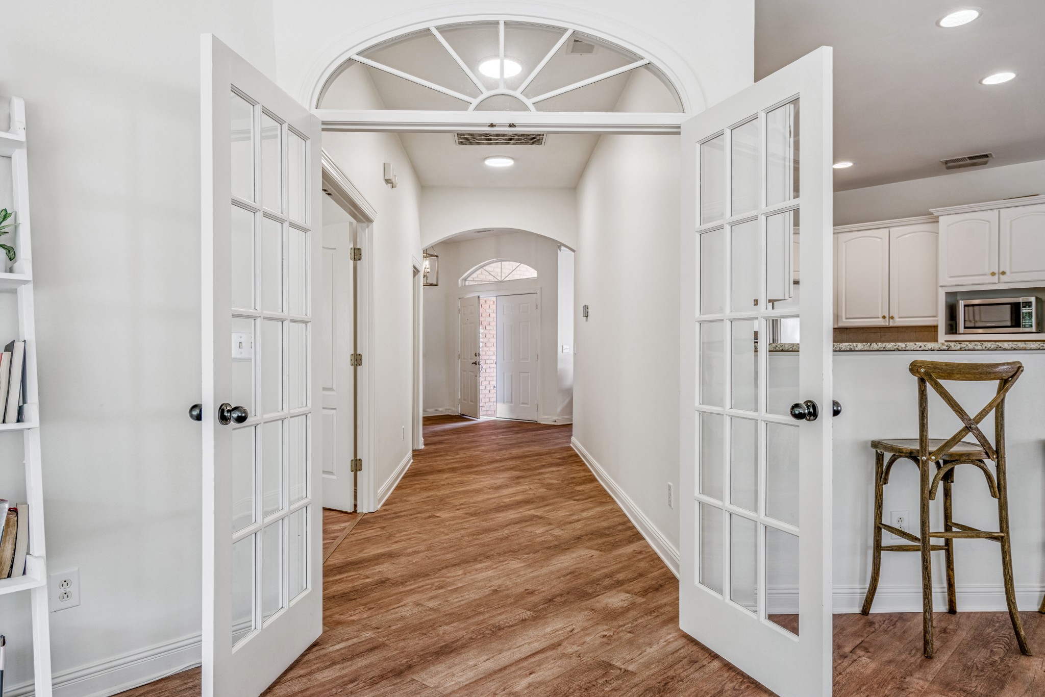 532 Bancroft Way Franklin, TN 37064 - Photo 8 of 48 a view of a hallway with wooden floor and staircase