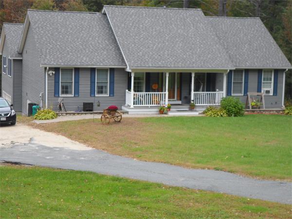 491 Petersham Road Athol, MA 01331 - Photo 2 of 22 a house with garden in front of it