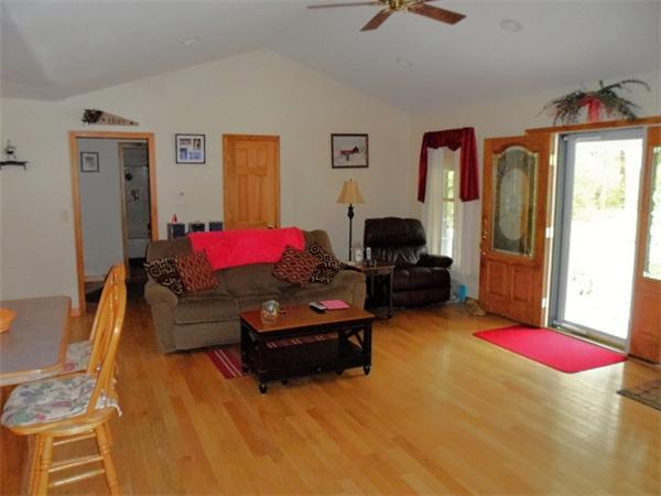 491 Petersham Road Athol, MA 01331 - Photo 6 of 22 a living room with furniture gym equipment and a window