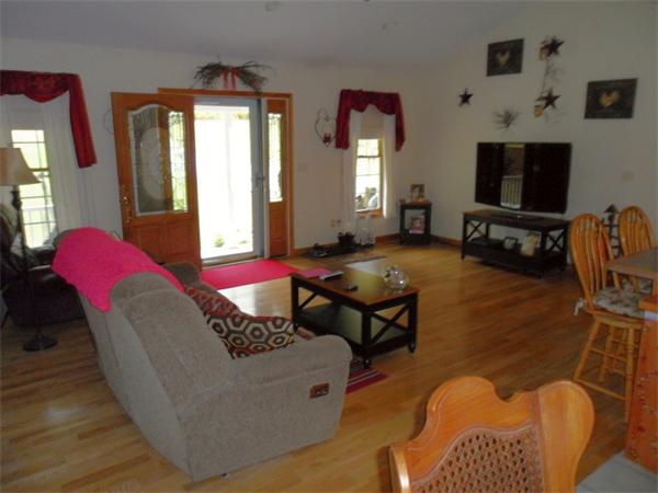 491 Petersham Road Athol, MA 01331 - Photo 7 of 22 a living room with furniture and a flat screen tv